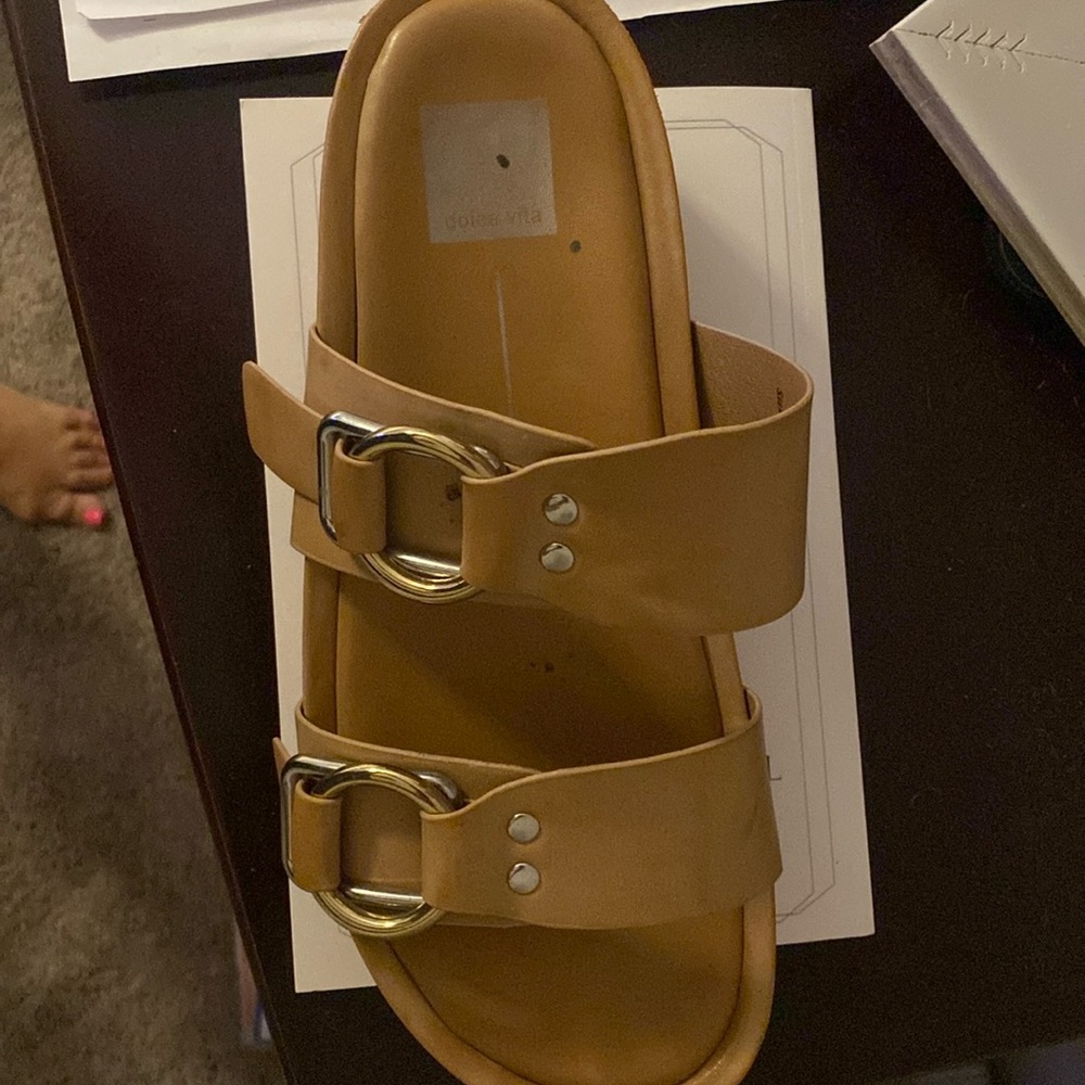Size 9.5 women’s Dolce Vita sandals with trendy big buckles. Neutral color